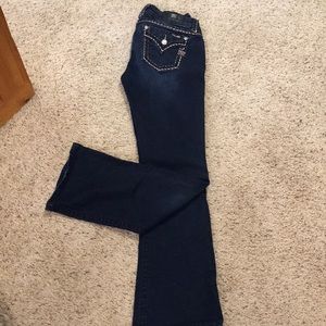 Women’s Miss Me Jeans.